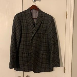 Grey check sports coat. Good condition. Made in America